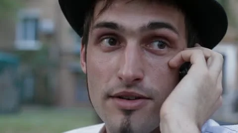 Man talking on the phone in a cafe Video stock 11128790