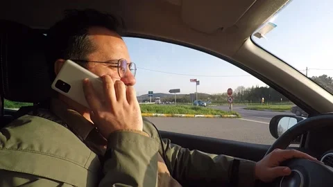 Man talking on phone in car Stock Footage 222823063