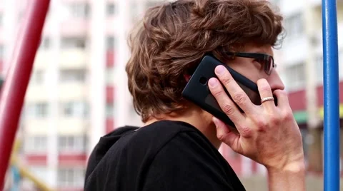 Man Talking on the Phone in the City Stock Footage 56252011