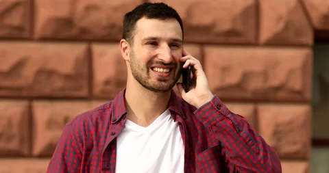 Man talking on a phone 스톡 동영상 140479012