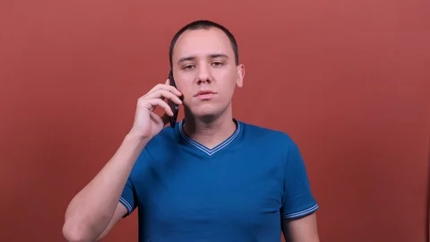 Man is talking on the phone. man emotion isolated. People sincere emotions Stock Footage 123017536