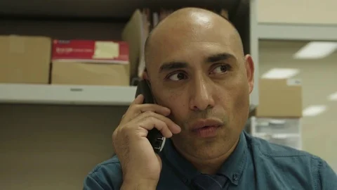 Man talking on the phone at office Stock Footage 83187958