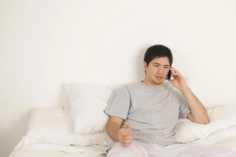 Man talking by phone Fotos Stock