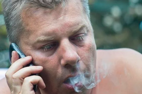 Man talking on a phone Фото