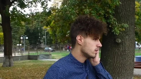 Man talking on the phone on the street Stock Footage 68592444
