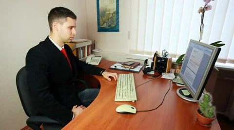 Man Talking On Phone At Work Video stock 39149852