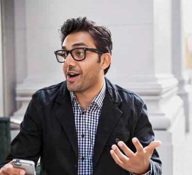 Man talking at sidewalk cafe Stock Photos