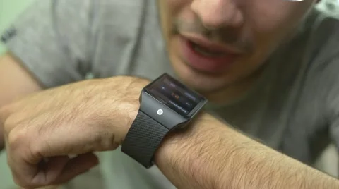 Man Talking to Smart watch Device HD Stock Footage 45029633