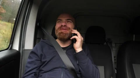 Man Talking on Smartphone in Car Passenger Seat Stock-Footage 328644013