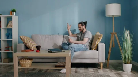 Man Is Talking via Tablet Computer 스톡 동영상 129891235