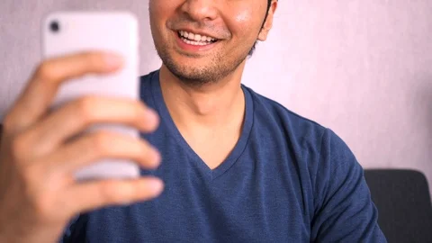 Man talking on video call on smart phone Stock Footage 88734286