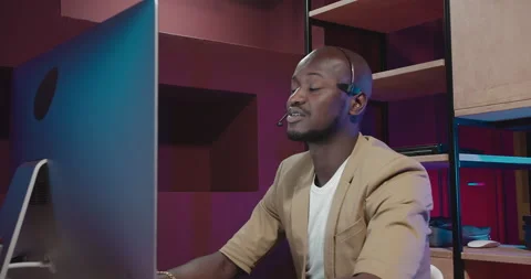 The man is talking via video link Video stock 154982874