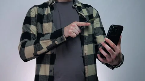 A man is talking on a video link on the phone 스톡 동영상 310903252