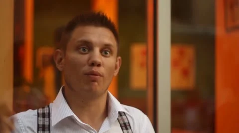 Man talks in cafe Stock Footage 8641469