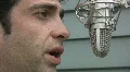 Man talks to microphone. Closeup. HD Footage