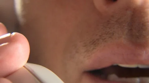 A man talks on the phone close up. Stock Footage 99612552