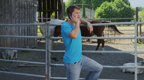 Man Talks on Phone in Ranch Stock Footage 35298750