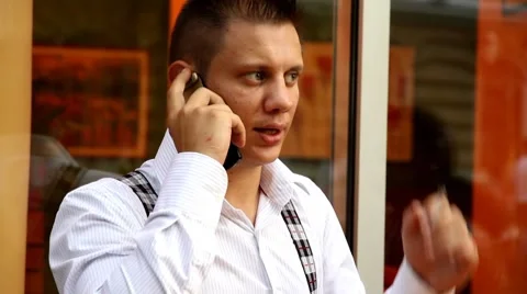 Man talks on telephone Stock Footage 8628994