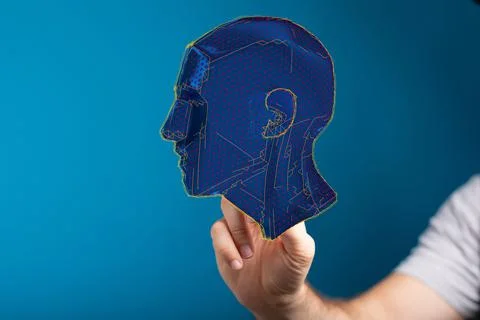 Man tapping on a blue 3D rendered human head 스톡 사진