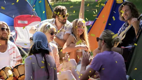 Man tapping bongo drums and friends clapping with golden confetti bursting at Stock Footage 311083539