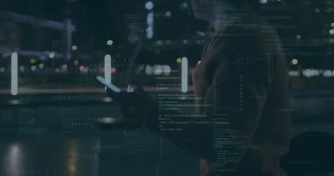 Man tapping glowing device near lit bollards, starting code overlays and Stock-Footage 329812948