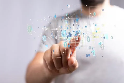 Man tapping on a hologram of binary codes - digital transformation concept Stock Photos