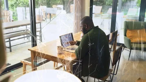 Man tapping laptop trackpad after on-screen prompt, reviewing business files Stock Footage 333936581