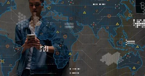 Man tapping phone and activating world map, hex grids, data tiles around him for Foto stock
