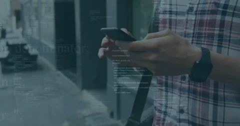 Man tapping phone on curb scrolling writing for tech demo as code overlay Stock Footage 333968030