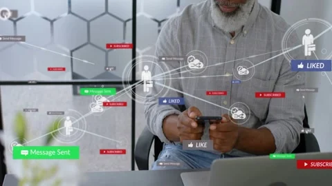 Man tapping phone at desk, starting marketing UI with badges linking users and Stock Footage 330916786