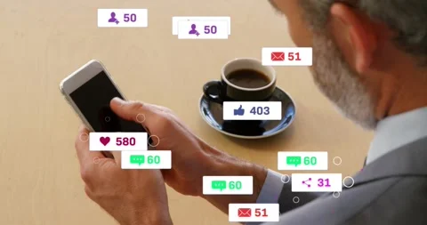 Man tapping phone, spawning social media badges over cup, swiping, checking Stock Footage 329870520