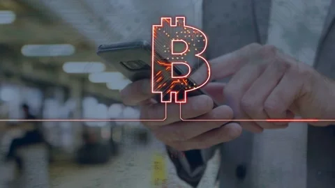 Man tapping phone at station, opening crypto-app while BTC overlay and red line Stock Footage 334466151