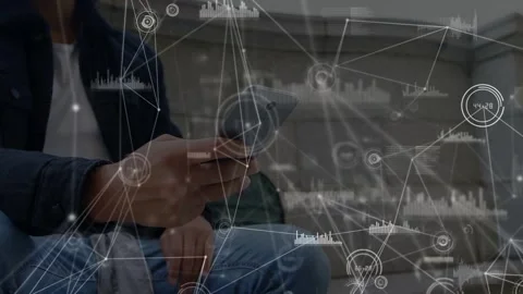 Man tapping phone on steps making live network graphs showing tech data while Stock Footage 332505140