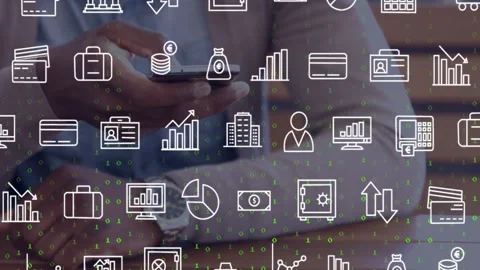 Man tapping phone at table, activating finance icons and falling binary digits, Stock Footage 329869954