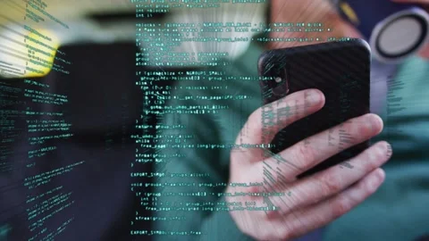 Man tapping smartphone in car, revealing green code overlay forming 3D tech Stock Footage 332981882