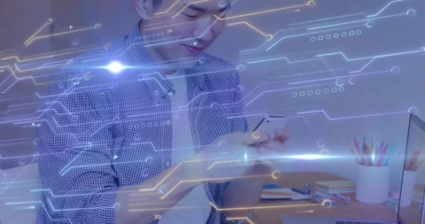 Man tapping smartphone, checking tech app by laptop as camera rising, circuit Stock Footage 333830038