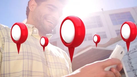 Man tapping smartphone, generating floating red map-pin overlays for mapping Stock Footage 335283057