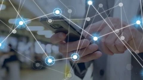 Man tapping smartphone in transit hub, generating pulsing network nodes mapping Stock Footage 334884221