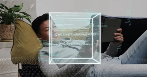 Man tapping tablet and activating wireframe cube code visualization exploring Stock Footage 316133454