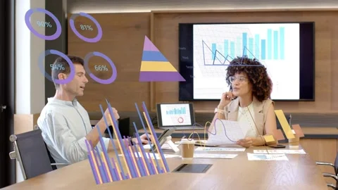 Man tapping tablet and causing animated percent rings, team reviewing business Stock Footage 333485601