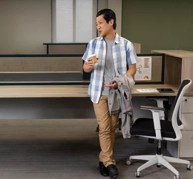 Man tapping tablet and showing office sales data, graphics reacting to tap and Stock Photos