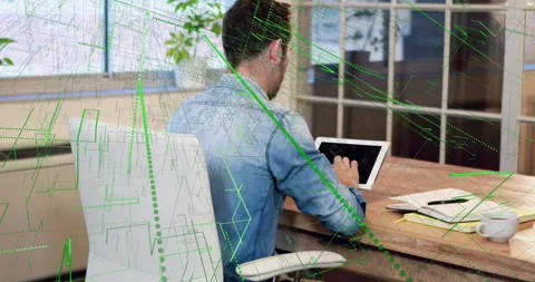 Man tapping tablet and swiping to show green data overlay for data analysis Stock Footage 314475194