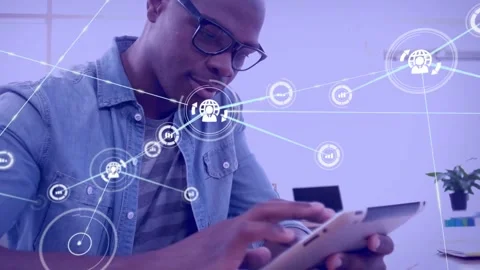 Man tapping tablet causing nodes, charts, globe icons spreading over hands, Stock Footage 334039349