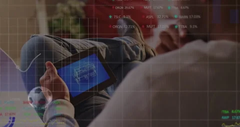 Man tapping tablet rotating model showing AR grid gauge and soccer visuals Video stock 311604684