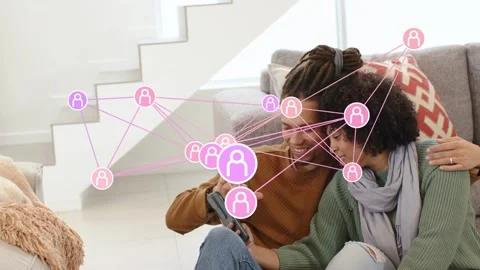 Man tapping tablet, sparking pink tech nodes clustering over tablet, pair Vídeo Stock 333689123