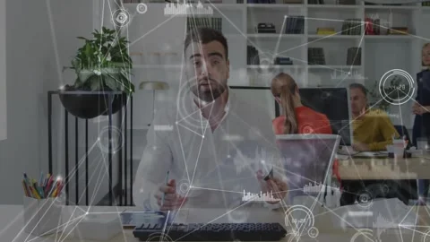 Man tapping tablet, speaking to camera in tech, HUD overlaying him showing data, Stock Footage 333829738