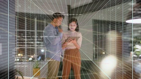 Man tapping tablet, woman reading in home tech causing 3D UI, light streaks over Stock Footage 333510088