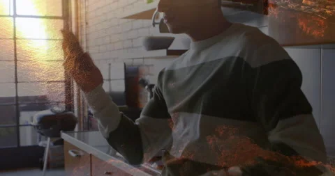 Man tapping touch device and activating animated icons before switching to call Stock Footage 314105951