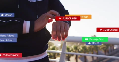 Man tapping watch on promenade, managing tech alerts while notifications Stock Footage 331615205