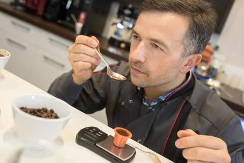 Man tasting coffee Stock Photos